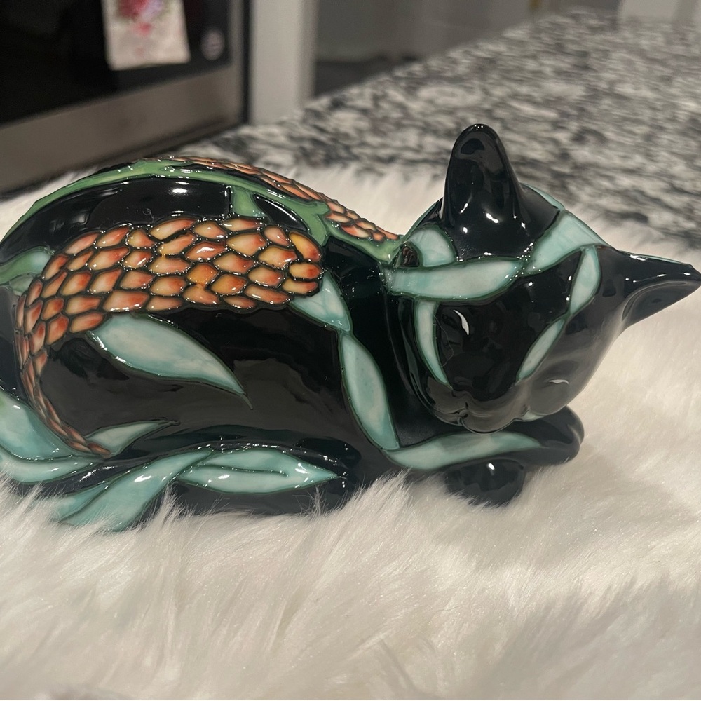 Black cat covered in florals design, sleeping cat figurine by willow hall